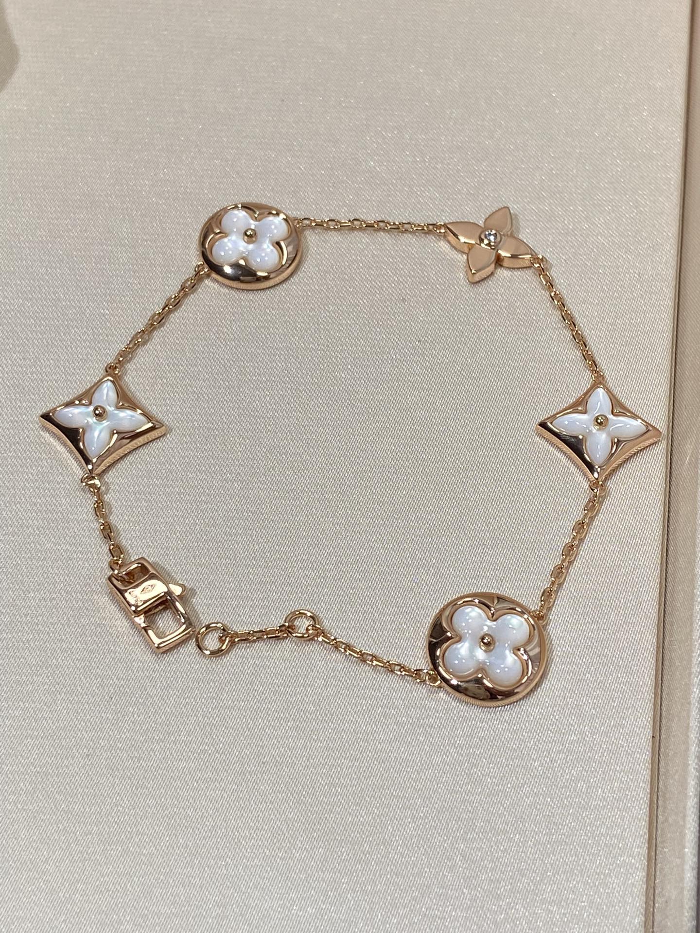 [ORA]STAR AND SUN 5 MOTIF MOP PINK GOLD BRACELET