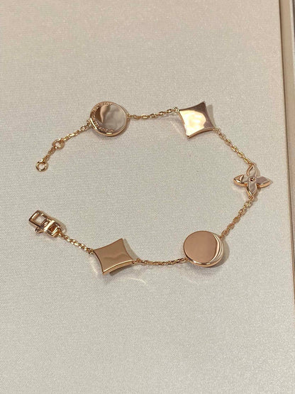 [ORA]STAR AND SUN 5 MOTIF MOP PINK GOLD BRACELET