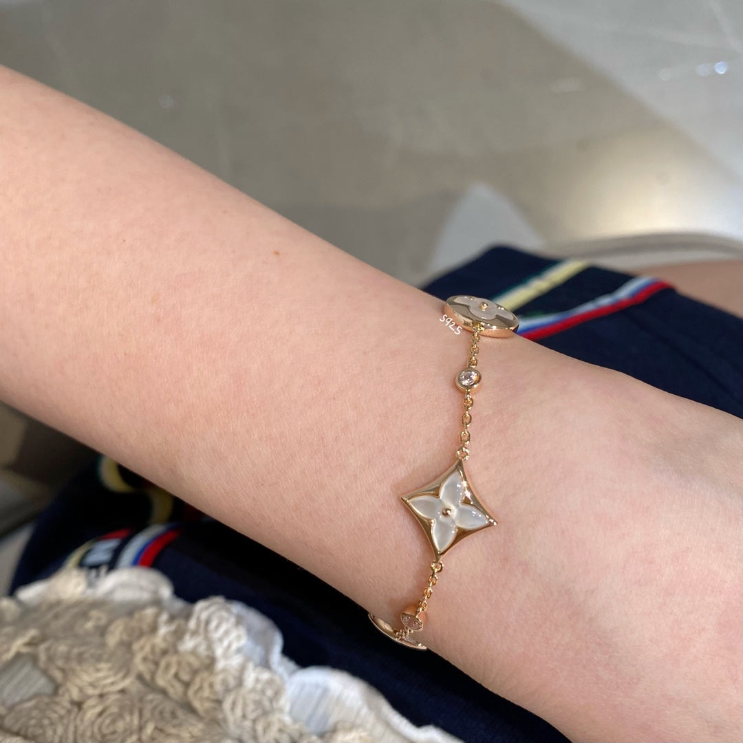[ORA]STAR AND SUN 4 MOTIF WHITE MOP PINK GOLD BRACELET